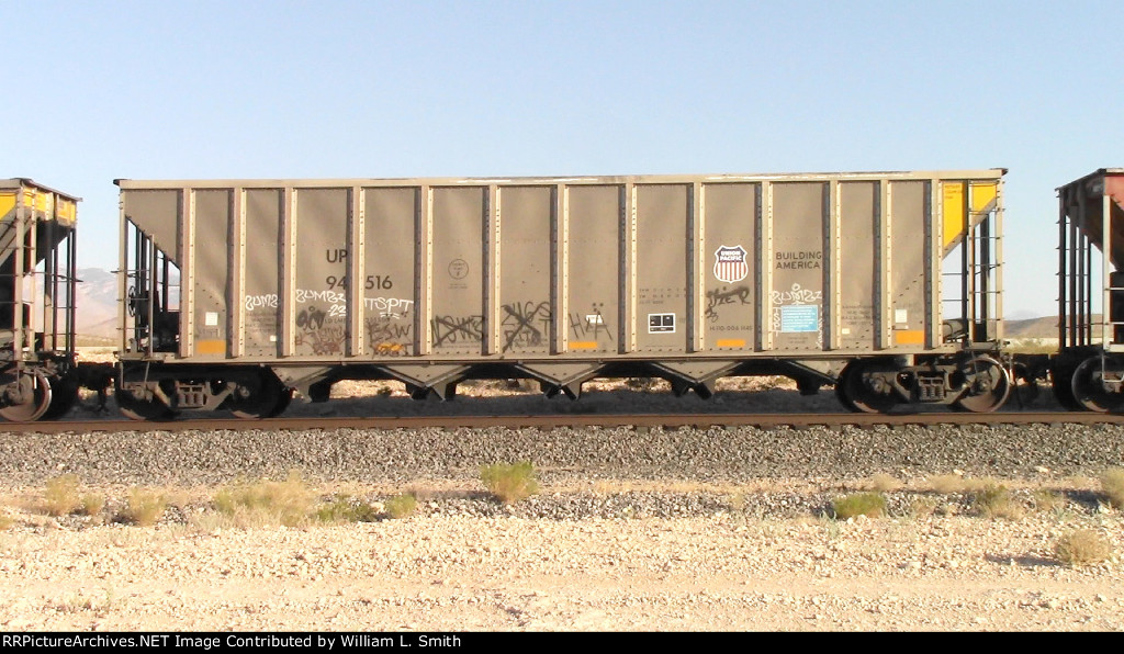 WB Unit Loaded Hooper Frt at Erie NV W-MdTrnSlv-Pshrs -74